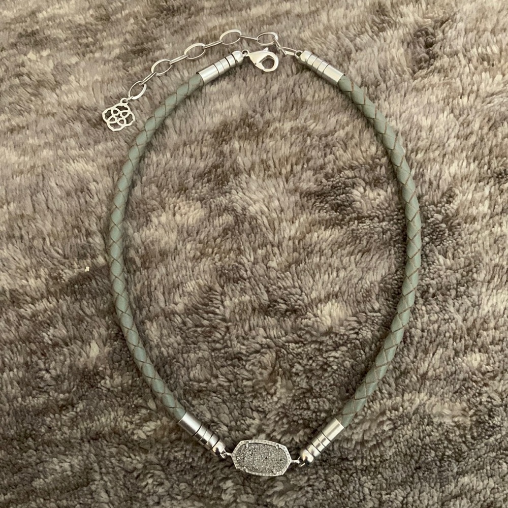 Kendra Scott shocker. Gun metal crystals incased in silver.